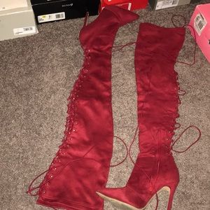 Red lace up back over the knee boots